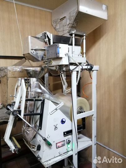 Машина упаковочная с дозатором весовым