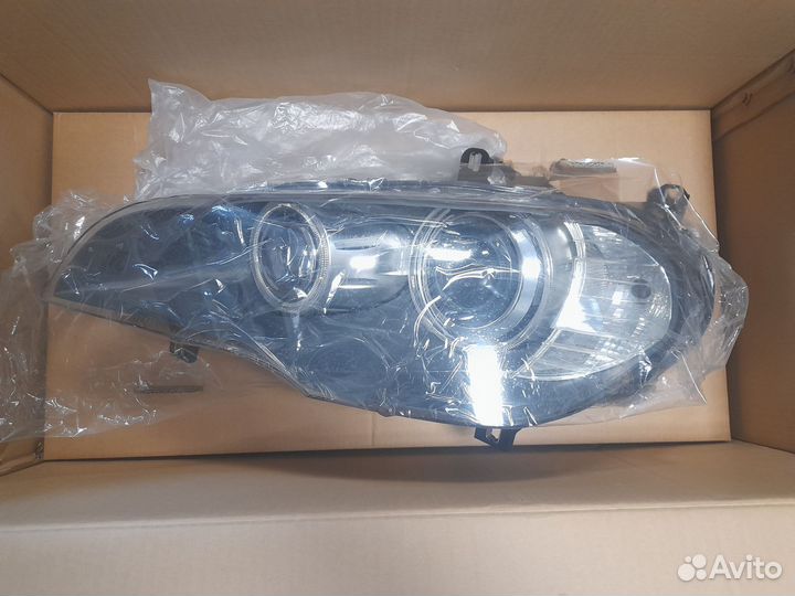 Фара левая BMW X5 E70 (2007)