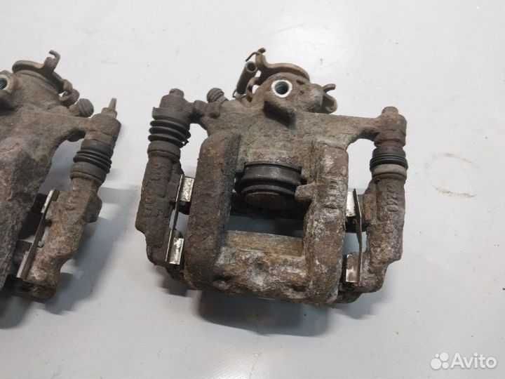 Суппорт тормозной задний Chevrolet Cruze седан 1.6