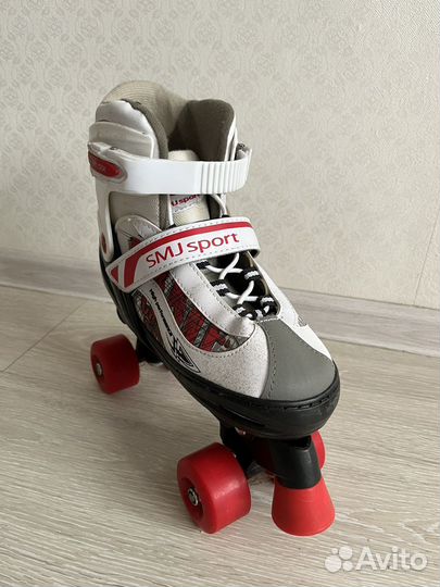 Коньки роликовые квады