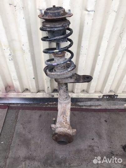 Стойка амортизатор левая Daewoo Nexia