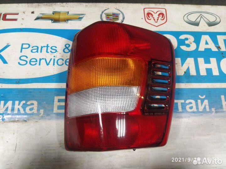 Фонарь левый Jeep Grand Cherokee WJ 03-04