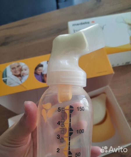 Medela молокоотсос, смартсоска, накладки на соски