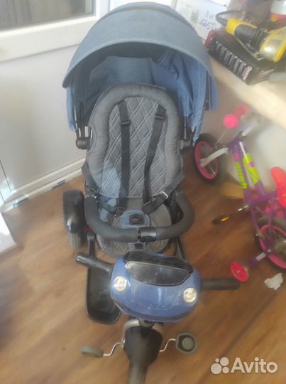 Трехколесный велосипед с ручкой