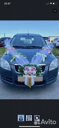 Свадебное украшение на капот автомобиля