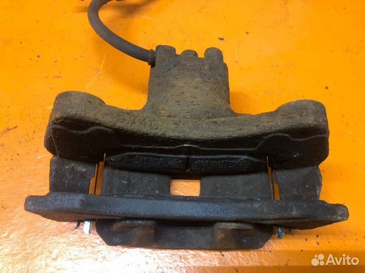 Суппорт тормозной передний левый Jeep Compass MK49