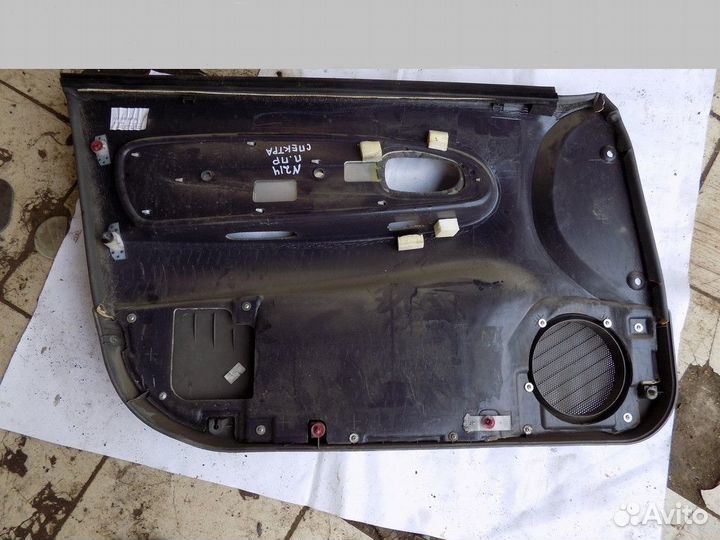 Обшивка двери передней правой Spectra 2001-2011