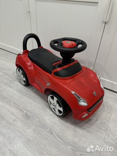 Детская машинка каталка с музыкой