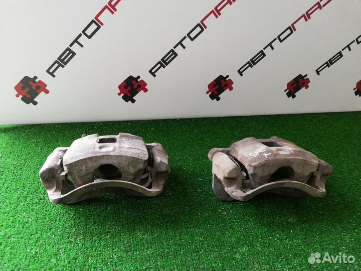 Суппорт передний левый правый Mitsubishi Galant 7