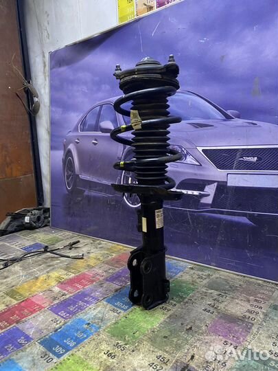 Стойка амортизатора передняя левая KIA K5