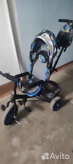 Трехколесный велосипед с ручкой