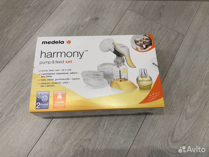 Молокоотсос medela ручной со смартсоской calma