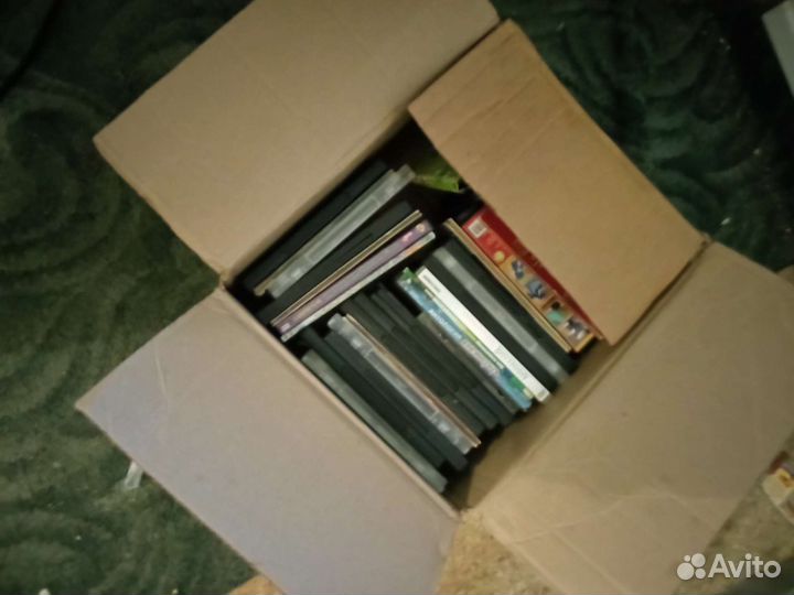 Коробки с dvd дисками + плеер