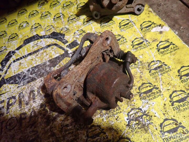 Суппорт тормозной передний левый Hyundai Solaris 1