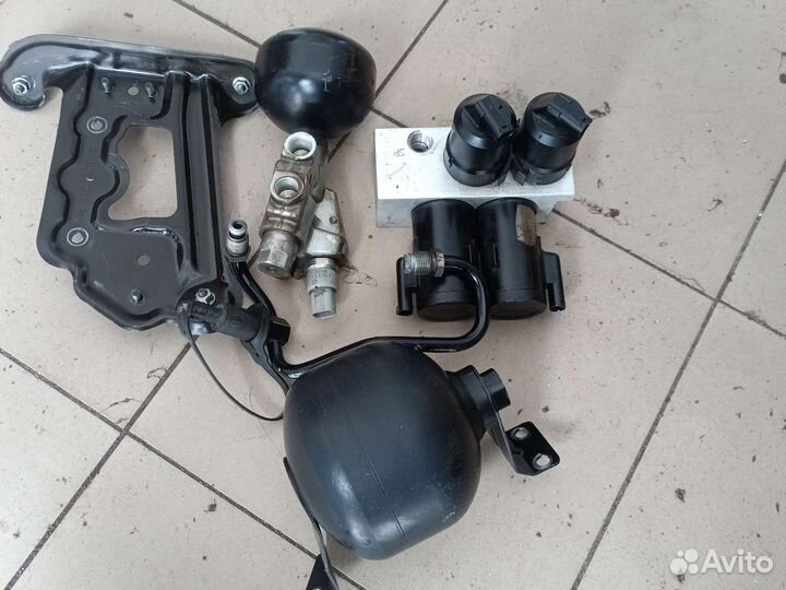 Блок клапанов гидроподвески