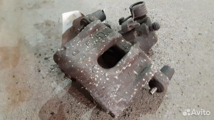 Суппорт тормозной задний левый ford focus II (2005