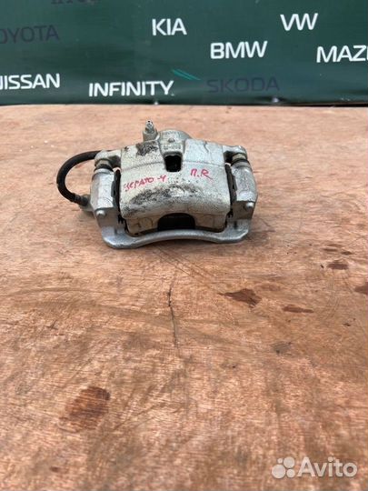 Суппорт тормозной передний правый Kia Cerato 4