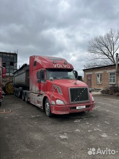 Volvo VNL 64T с полуприцепом, 2003