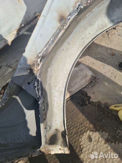 Крыло заднее правое Toyota Corolla 616011H130