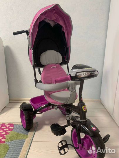 Трехколесный велосипед с крышей, музыкой