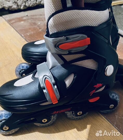 Роликовые коньки