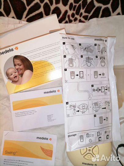 Молокоотсос medela электрический