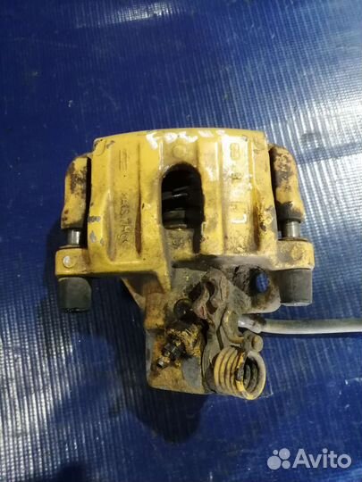 Суппорт задний левый Ford Focus 3