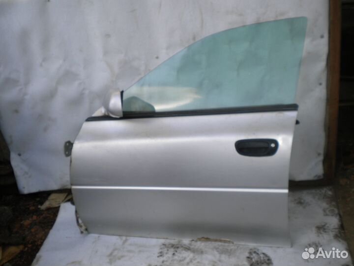 Стекло задней левой двери Subaru Impreza GF2 wagon