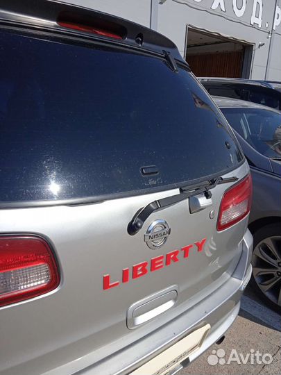 Продам (шильжик) буквы на 5 дверь Nissan Liberty
