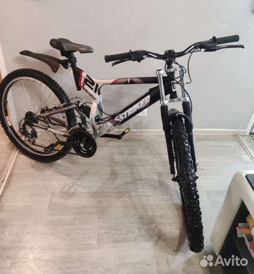 Скоростной горный двухподвесный велосипед Striker