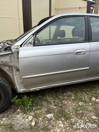 Передняя левая дверь киа спектра