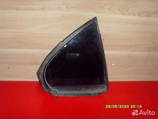 Стекло двери задней (форточка) 5740A018 Lancer 10