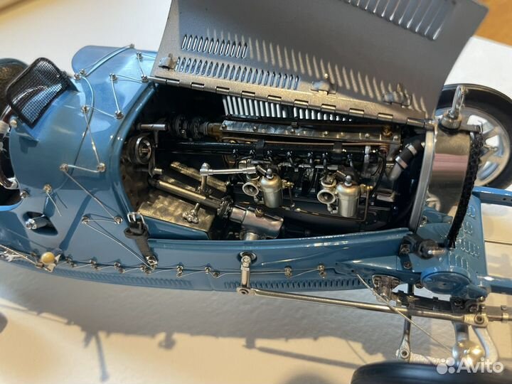 Модель автомобиля Bugatti Typ 35 G P1924 1:18 CMC