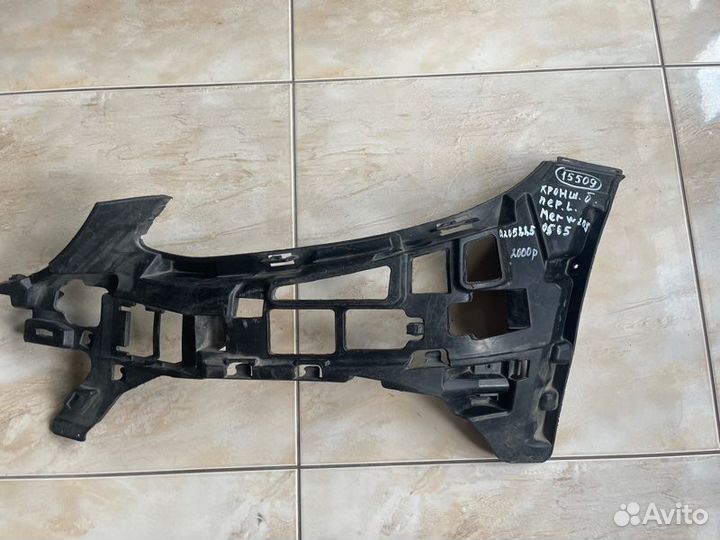 Кронштейн бампера передний левый Mercedes C Class