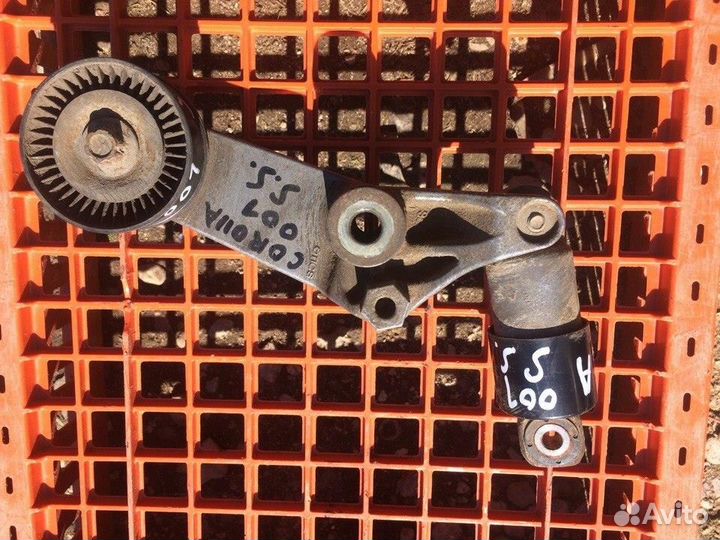 Натяжитель ремня Тойота Королла Е120