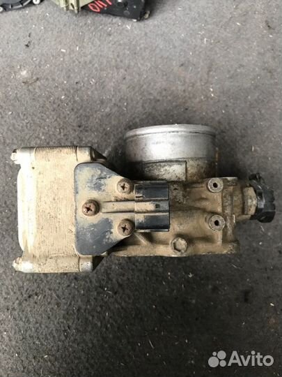 Дросельная заслонка Mitsubishi Lancer