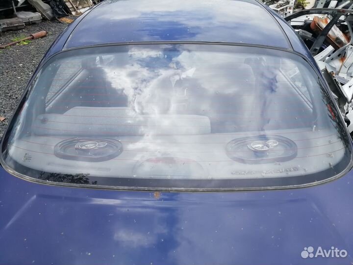 Стекло заднее Шевроле Ланос