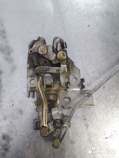 Замок крышки багажника Lancer 9