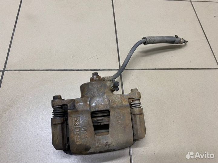 Суппорт передний левый Daewoo Nexia F16D3 2010