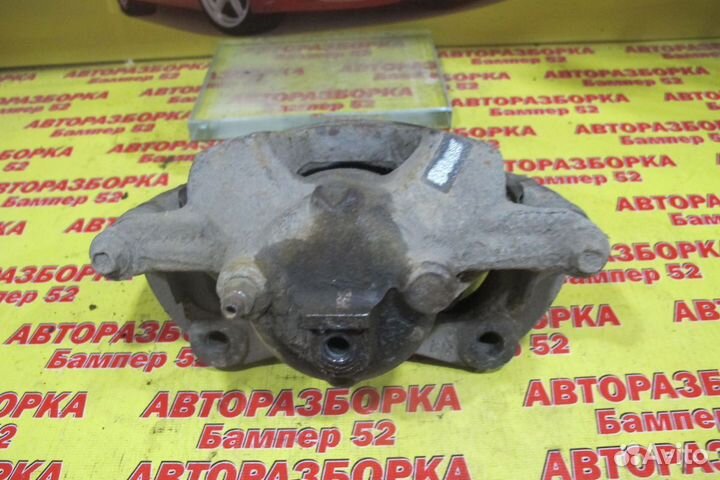 Суппорт тормозной передний левый Chevrolet Cruze