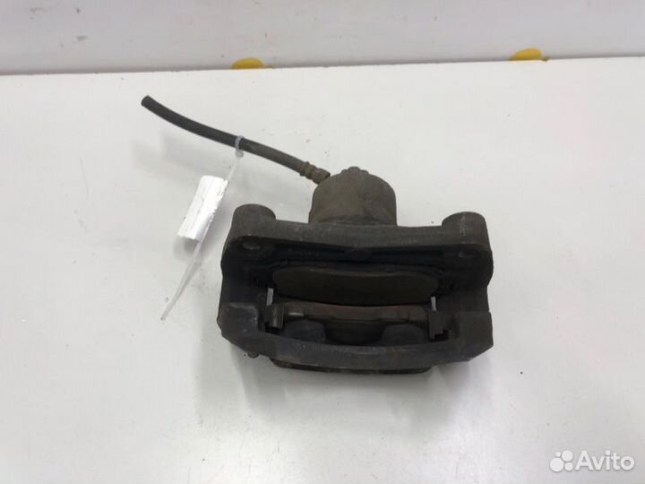 Суппорт тормозной передний левый Nissan Juke