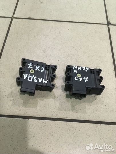 Моторчик заслонки печки Mazda сх7