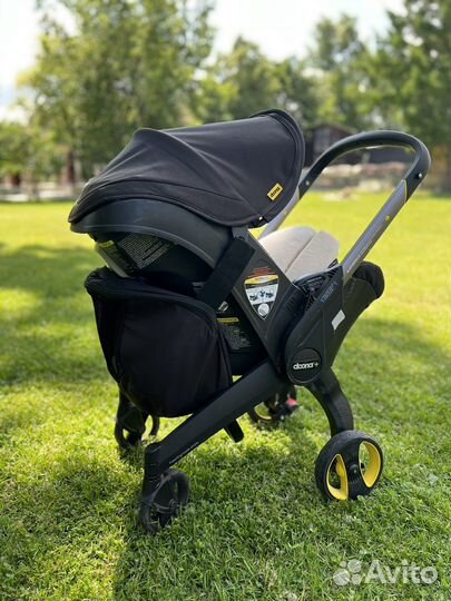 Коляска автокресло Doona с базой isofix