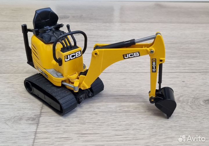 Игрушки Bruder автокран Man, мини экскаватор JCB