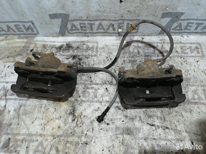 Суппорт передний левый Nissan Qashqai J10