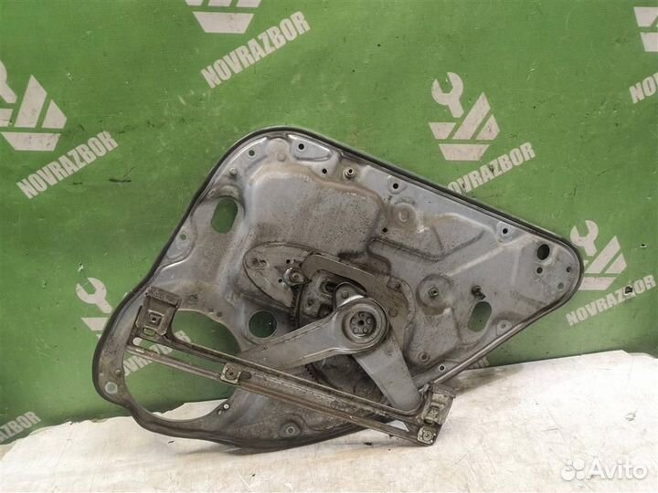 Стеклоподъемник механ. задний левый Форд Фокус 2