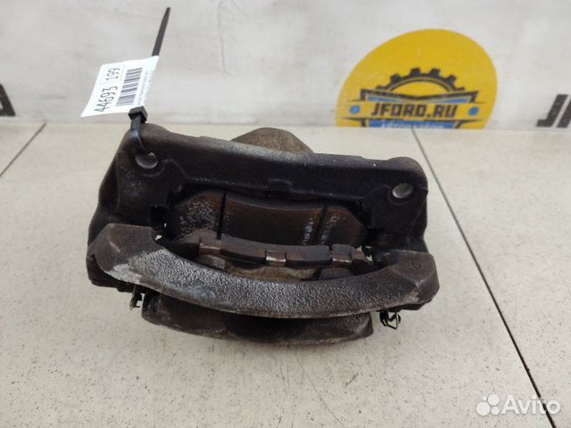 Суппорт тормозной передний левый Suzuki Vitara LY