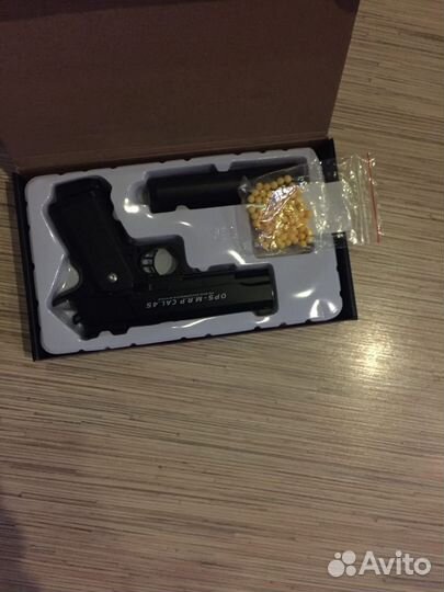 Игрушка пистолет