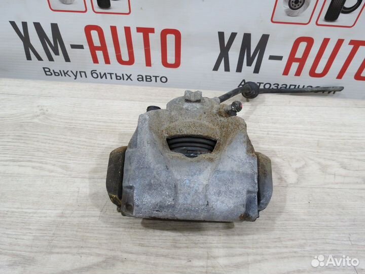 Суппорт тормозной передний левый Renault Duster