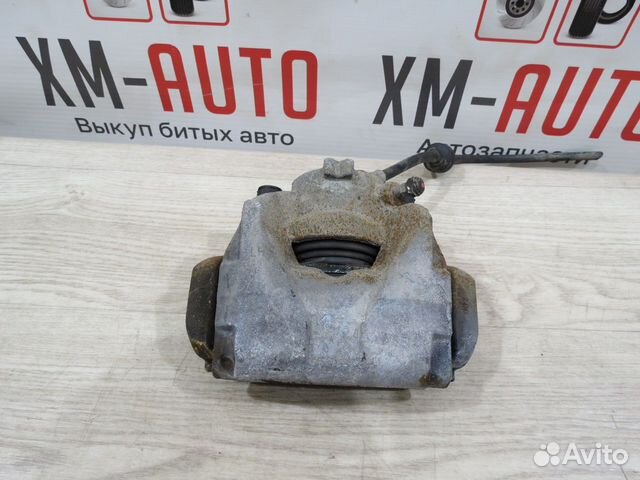 Суппорт тормозной передний левый Renault Duster